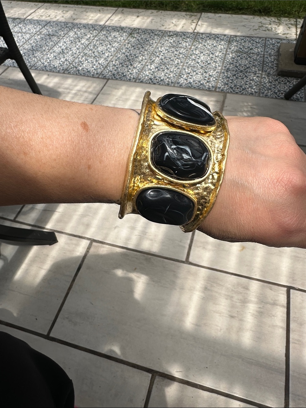 Gold Tone Cuff Bracelet with Black Stone Accents - Picture 2 of 5